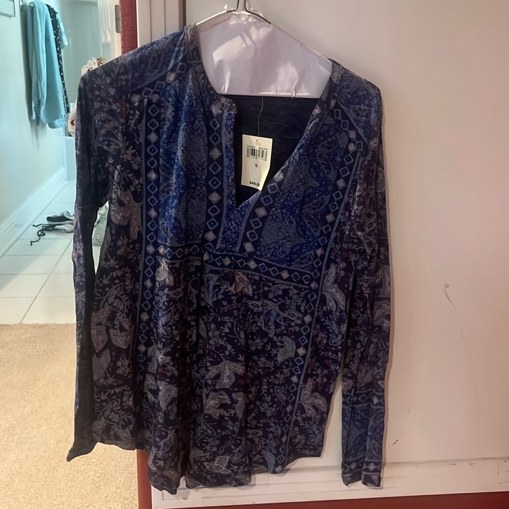 Cute blue blouse never worn. Tags still on!
